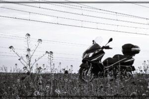Black and white photo of maxi scooter piaggio x10 - mckornik.com